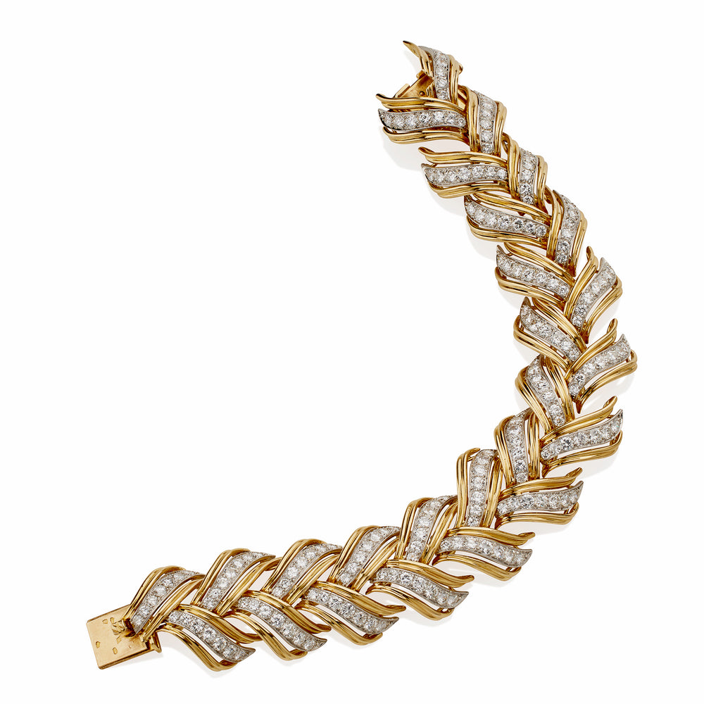 
                      
                        Macklowe Gallery French 18K Gold and Diamond Braided Leaf Bracelet
                      
                    