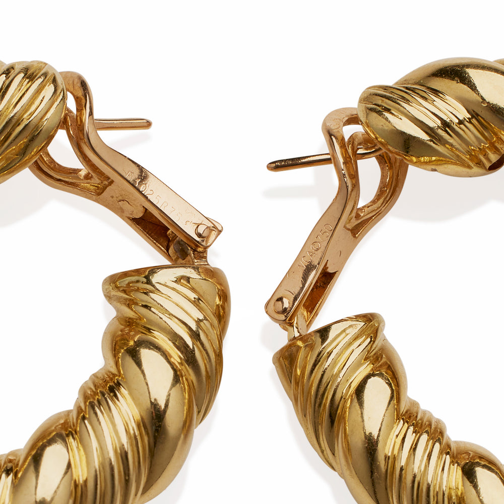 
                      
                        Macklowe Gallery Van Cleef & Arpels Paris 18K Gold Twisted Hoop Earrings
                      
                    