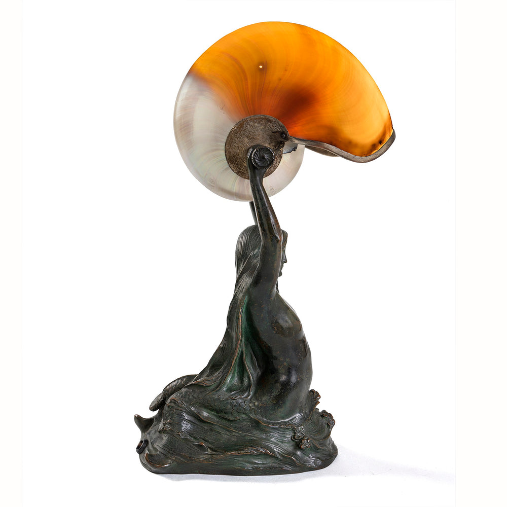 
                      
                        Macklowe Gallery Tiffany Studios New York "Nautilus" Table Lamp With "Mermaid" Base
                      
                    