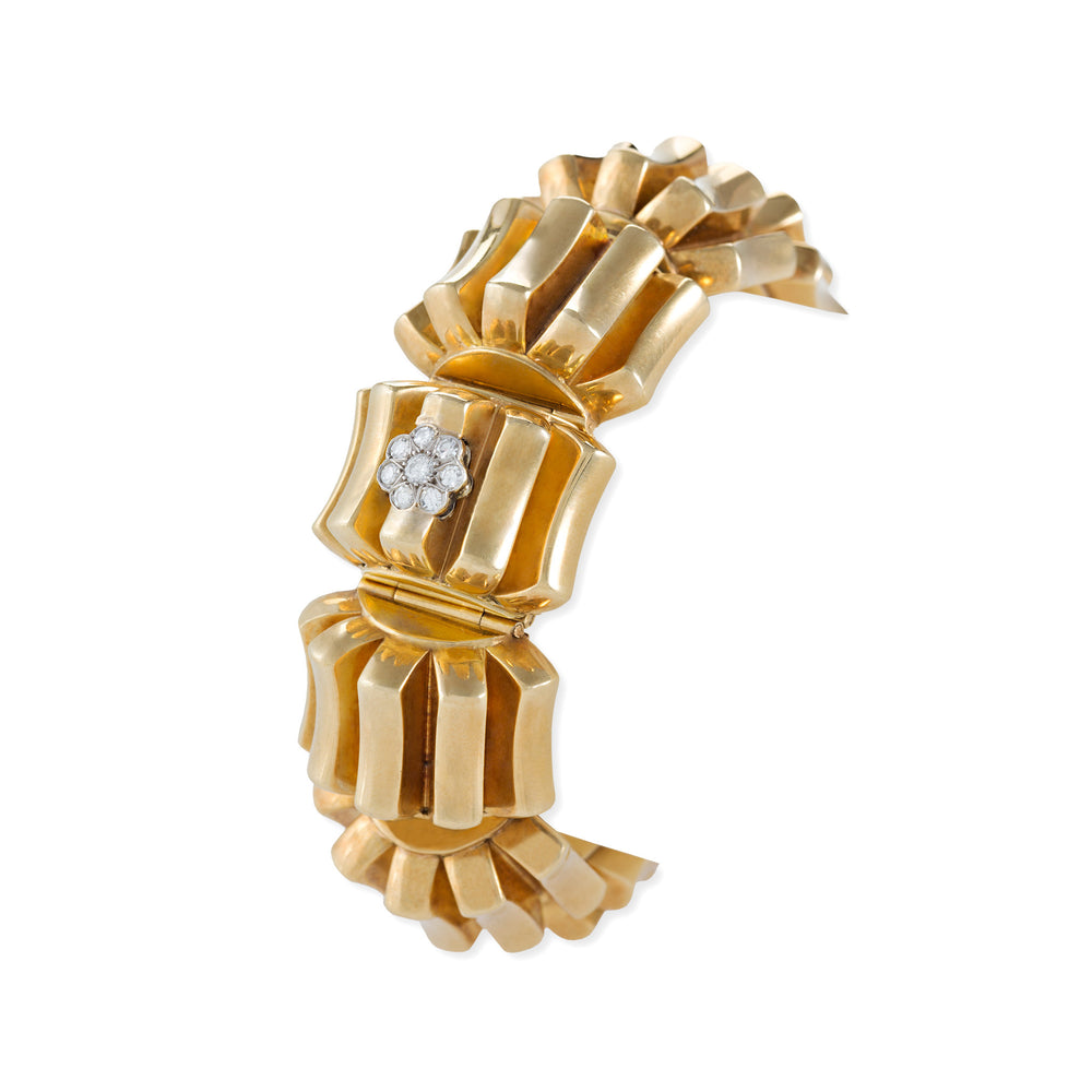 
                      
                        Macklowe Gallery Omega Gold and Diamond Concealed Bracelet Watch
                      
                    